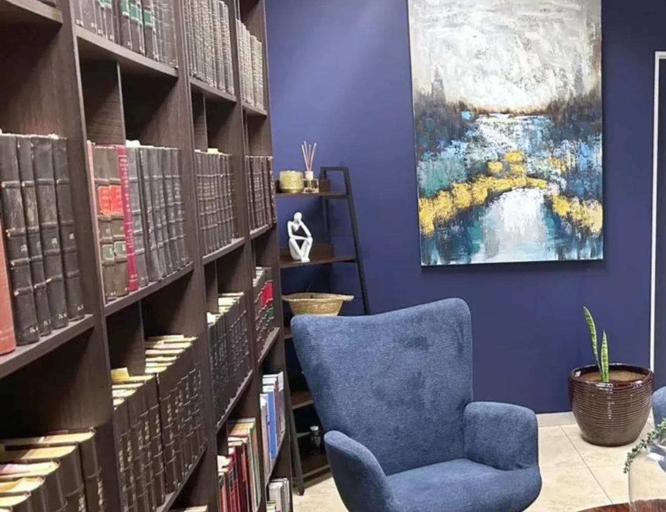 Bound law reports and seating at MV Inc's offices in Floracliffe, Johannesburg